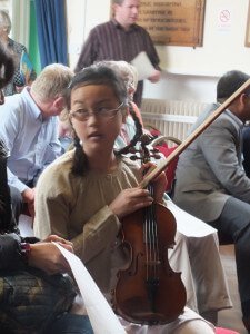 Young Violinist Preparing for Concert